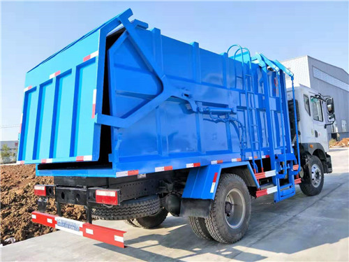 東風(fēng)多利卡D9側(cè)裝壓縮式垃圾車圖片 東風(fēng)多利卡D9側(cè)裝壓縮式垃圾車圖片